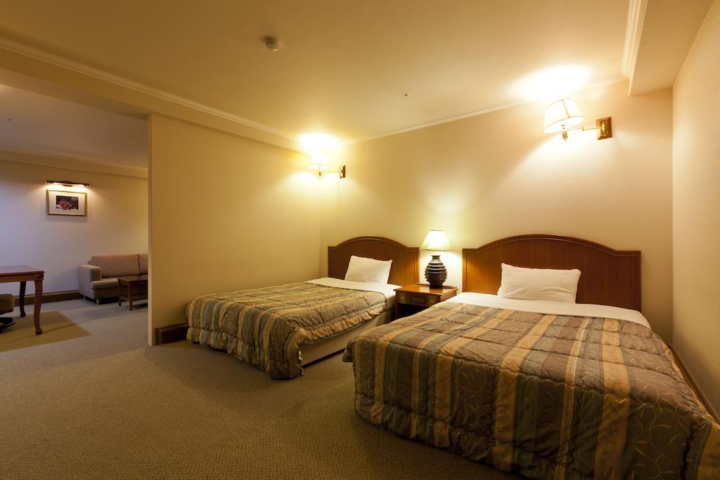 Station Hotel Au Tsu Bilik gambar