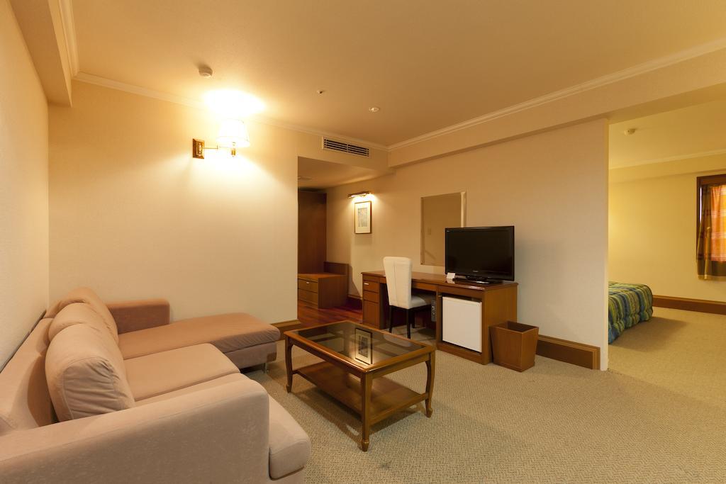 Station Hotel Au Tsu Bilik gambar