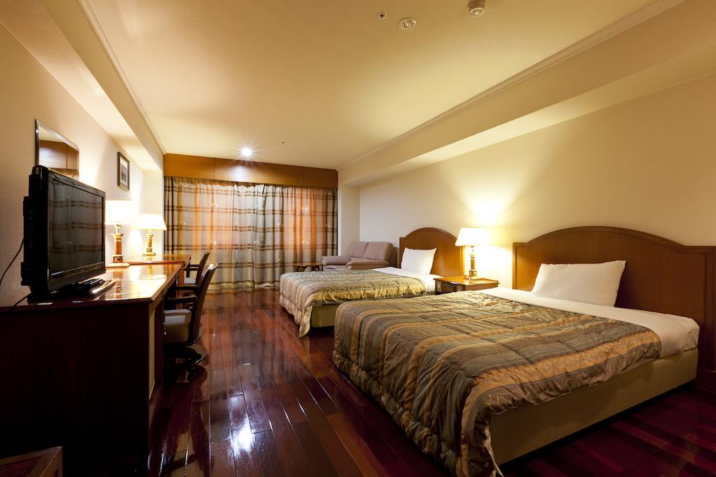 Station Hotel Au Tsu Bilik gambar